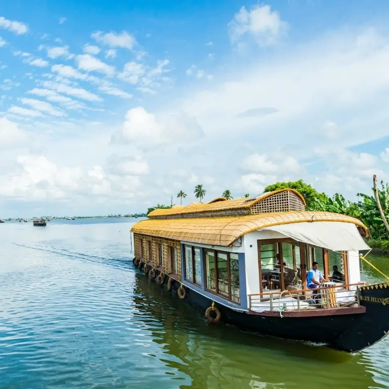 Houseboat cruising on tranquil waters