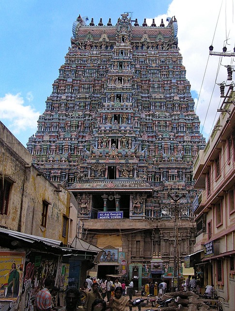 Meenakshi Amman Temple gopuram illuminated at dusk — iconic Madurai group tours landmark